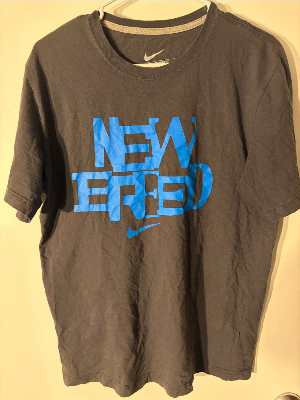 Nike Men’s Gray Short-Sleeve Tee with Bright Blue 'New Breed' Graphic